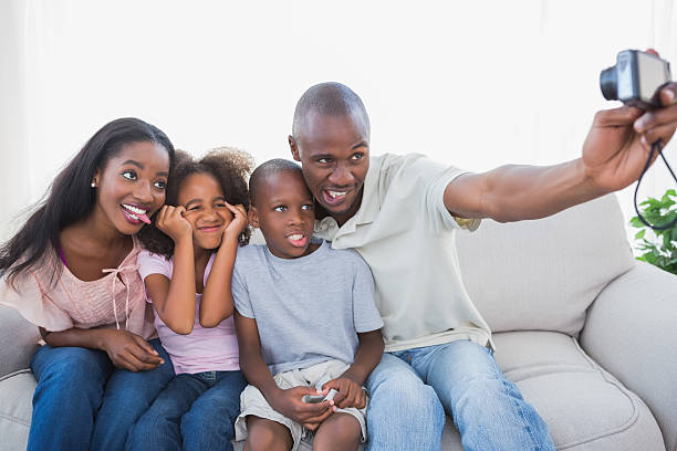istock Family pulling funny faces for a photo 457227369