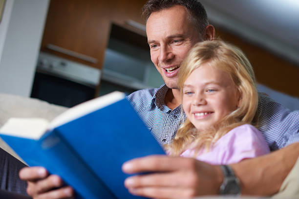 istock I love it when daddy reads to me 457227441