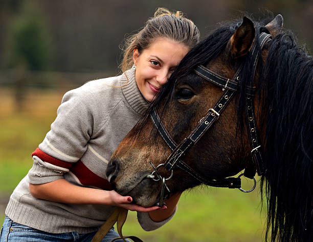 istock Girl with Horse 457227975