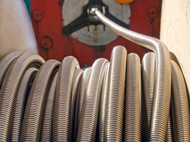 istock Flexible metal hose coil. 457240981