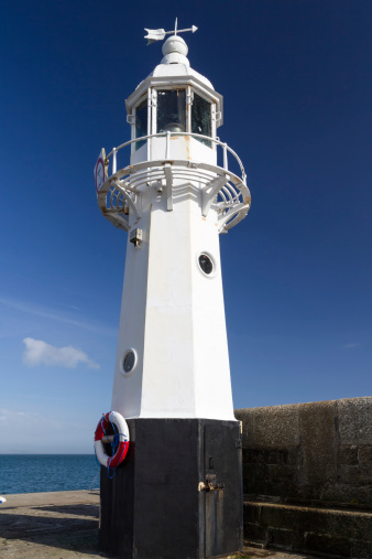 Lighthouse on the pier at Mevagissey Cornwall England UK Europe