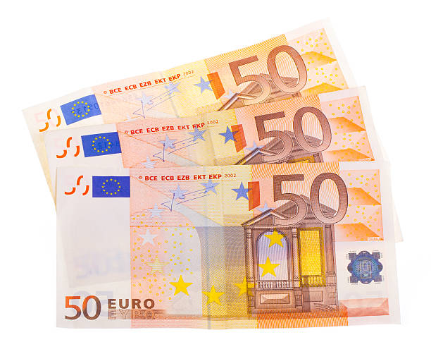 istock Some isolated 50 euro banknotes 457330783
