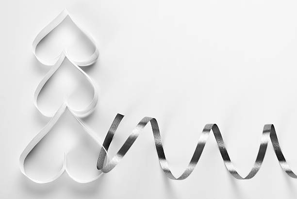 istock Origami Christmas tree with ribbon decoration 457331981