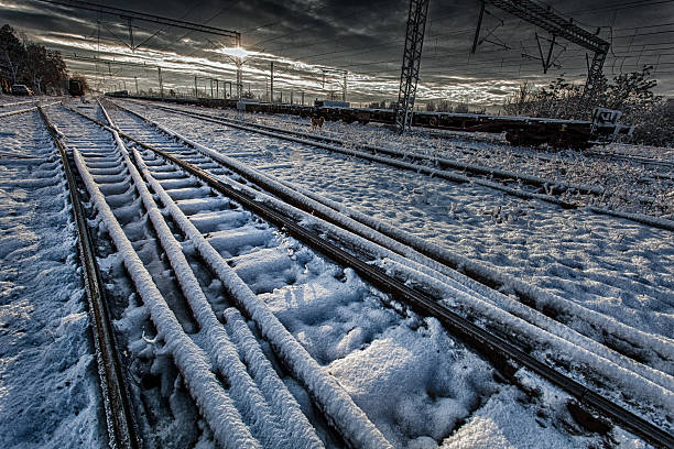 railway tracks in winter stock photo