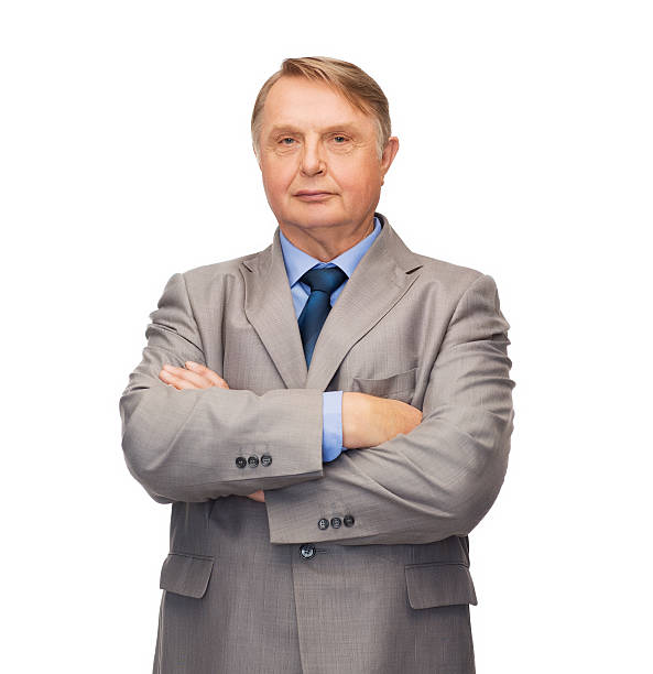 istock serious businessman or teacher in suit 457343649