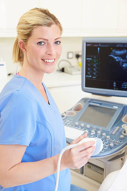 istock Portrait Of 4D Ultrasound Scanning Machine Operator 457347561