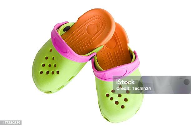 Photo libre de droit de Sandales En Caoutchouc Colorés Pour Les Enfants banque d'images et plus d'images libres de droit de Crocodile - Crocodile, Chaussures, Femmes