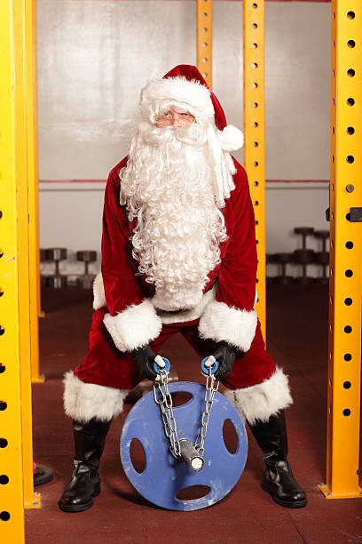 Santa Claus  training before Christams time in gym