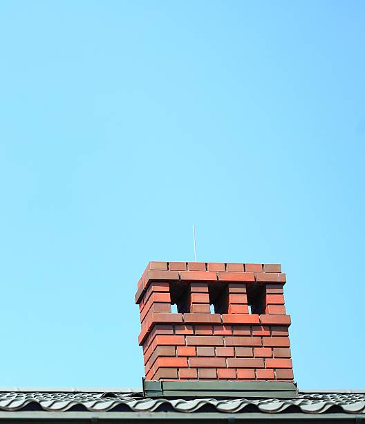 istock Chimney on the roof sky background 457387969