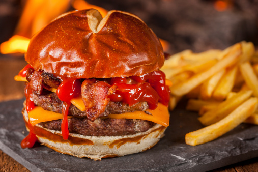 Unhealthy Homemade Barbecue Bacon Cheeseburger with Fries