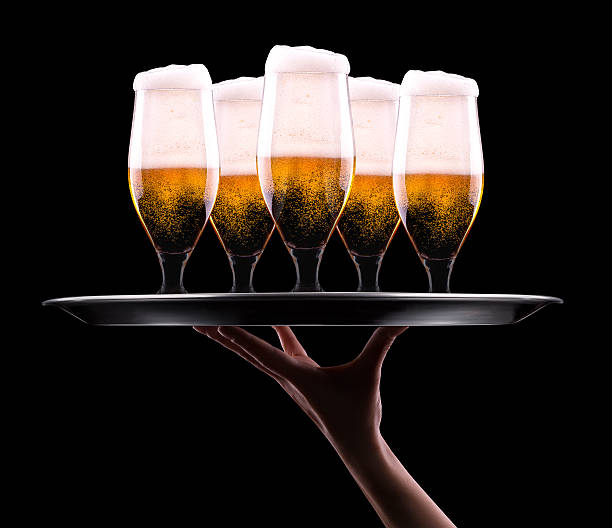 istock Beer into glass on a black 457388807
