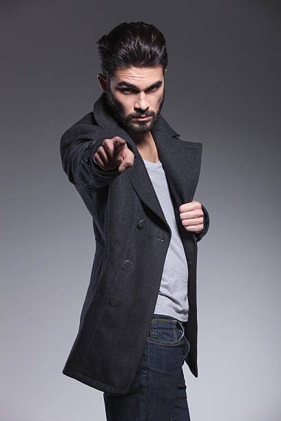 istock man with long beard is pointing his finger accusing you 457389817