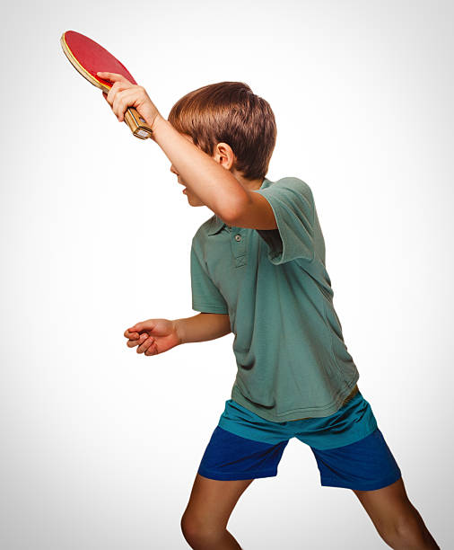 istock ping pong boy blond man table tennis playing 457391507