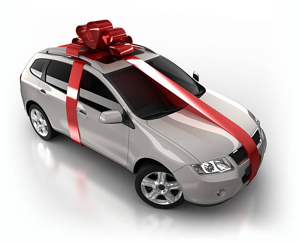 istock gift wrapped SUV Car in studio - isolated on white 457392783