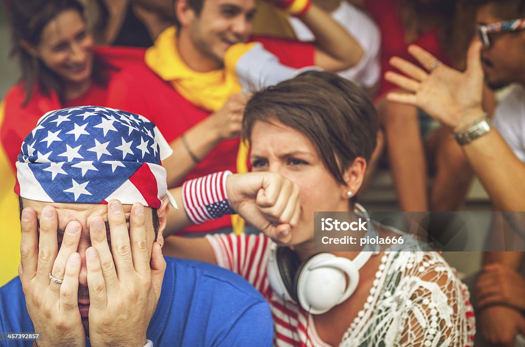 Wold championship supporters: delusion after a defeat Group of different nations supporters together Soccer Stock Photo