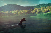 Loch Ness monster swimming in the lake