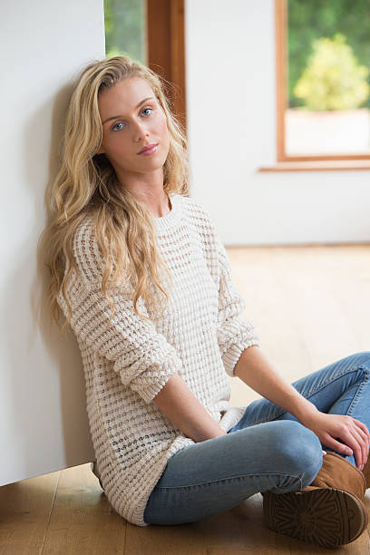istock Young Girl Leaning Against Wall 457394269