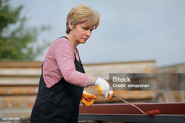 Female Worker Stock Photo - Download Image Now - 40-49 Years, 50-59 Years, Adult