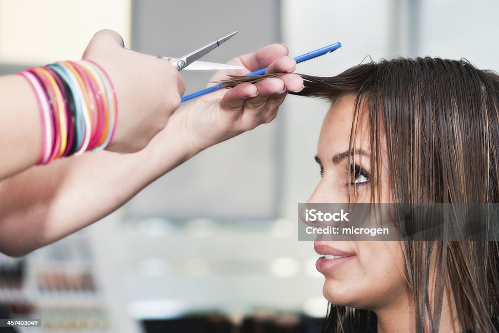 Cutting hair at hairdresser's salon Hair Salon - hairdresser cutting hair 20-29 Years Stock Photo