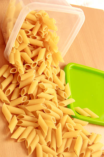 istock Dried pasta preserve in plastic box 457411383