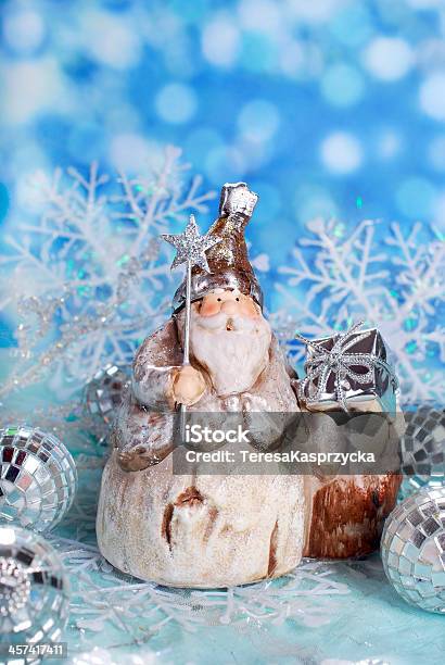 Christmas Card With Vintage Santa Figurine On Winter Blue Background Stock Photo - Download Image Now