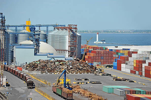 A pile of scrap metal at a port.