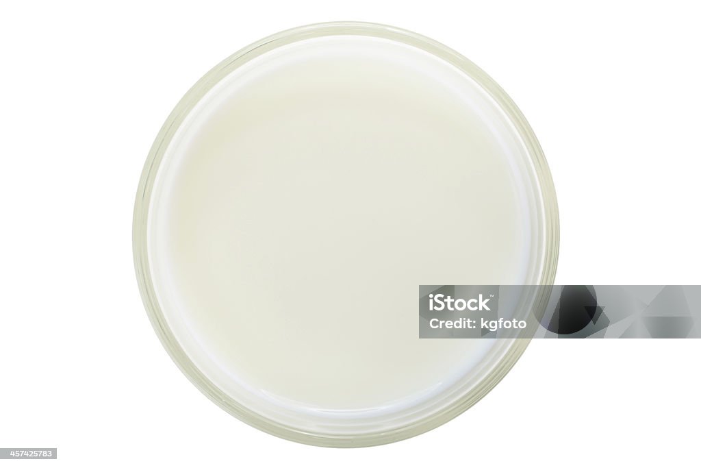 Glass of milk as seen from above on white background Glass of milk from above with clipping path Dairy Product Stock Photo