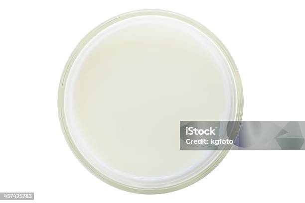 Glass Of Milk As Seen From Above On White Background Stock Photo - Download Image Now