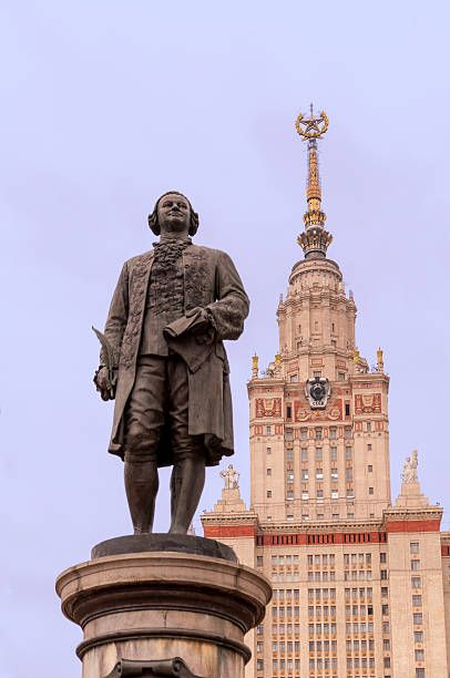 Mickhail Lomonosov and Moscow State University building symbol of the Russian graduation and education - Mikhail Lomonosov statue and Moscow State University building mikhail lomonosov stock pictures, royalty-free photos & images