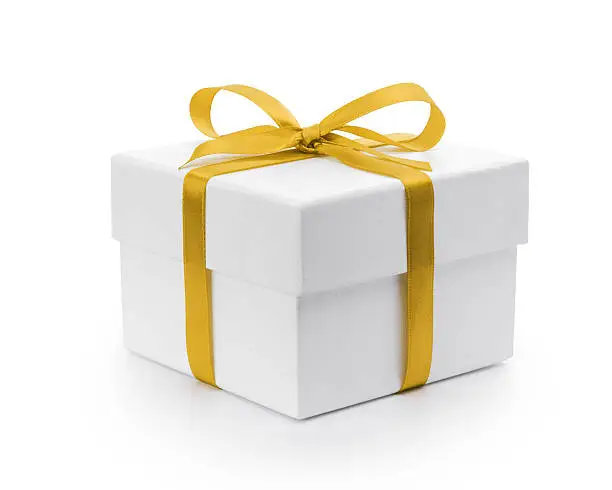 Photo of white textured gift box with yellow ribbon bow