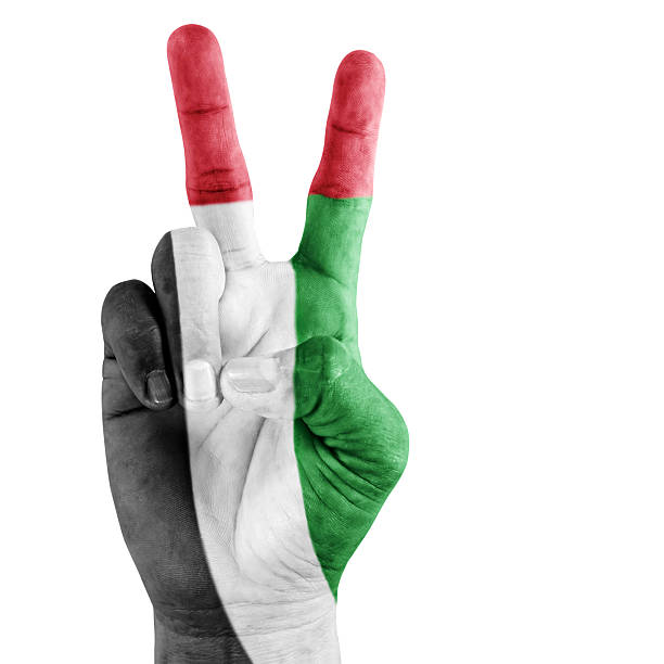 istock United Arab Emirates Flag On Victory Hand 457452881