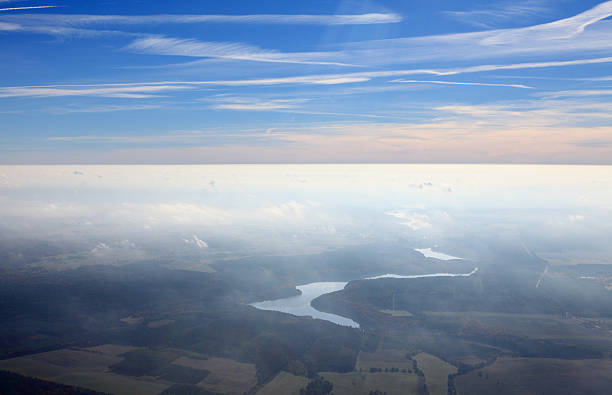 Blue sky above the thermal inversion. Autumn Aerial view. Poland earth's atmosphere stock pictures, royalty-free photos & images