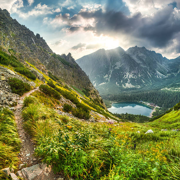 istock Mountain landscape with a lake at a valley 457485263