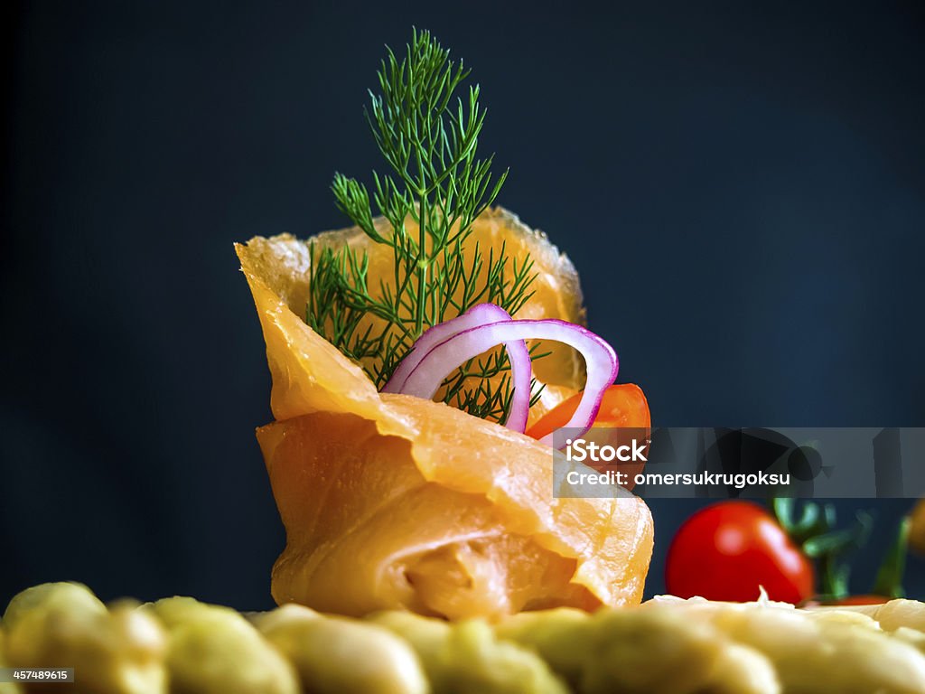 Smoked Salmon Roll and Asparagus Smoked salmon roll with asparagus. Selective focused on salmon. Canape Stock Photo