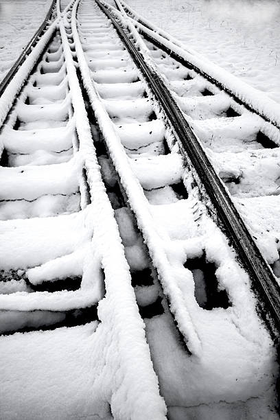 railway tracks in winter stock photo