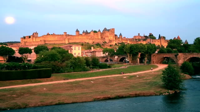 HD panning shot: Carcassonne Cityscape France at dusk