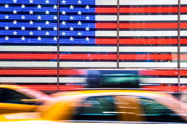 istock Yellow cab in front of American Flag 457503927