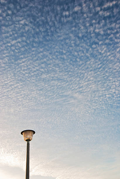 Cтоковое фото Улица лампа с облаками над головой