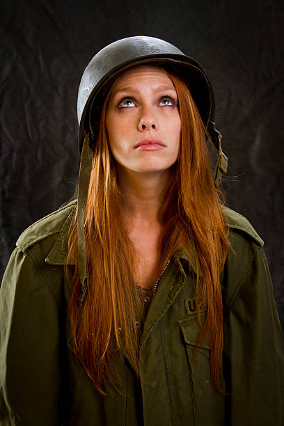 istock Army Girl Looking Up 457514347