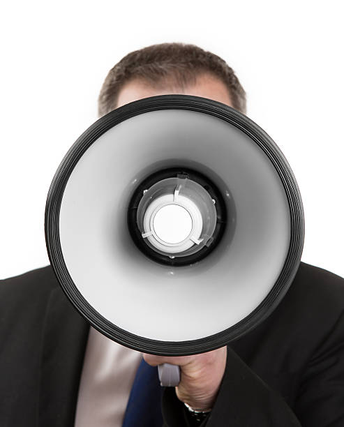 istock Businessman shouting in a megaphone 457517557