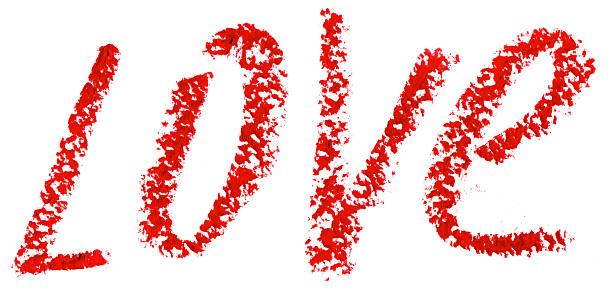 istock Word LOVE is written with lipstick. Isolated on white 457543007