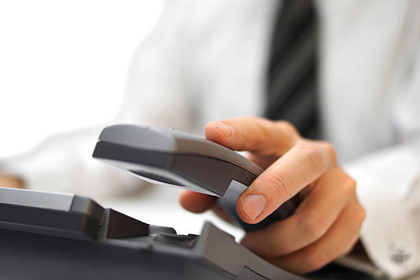 istock businessman is answering the phone 457678509