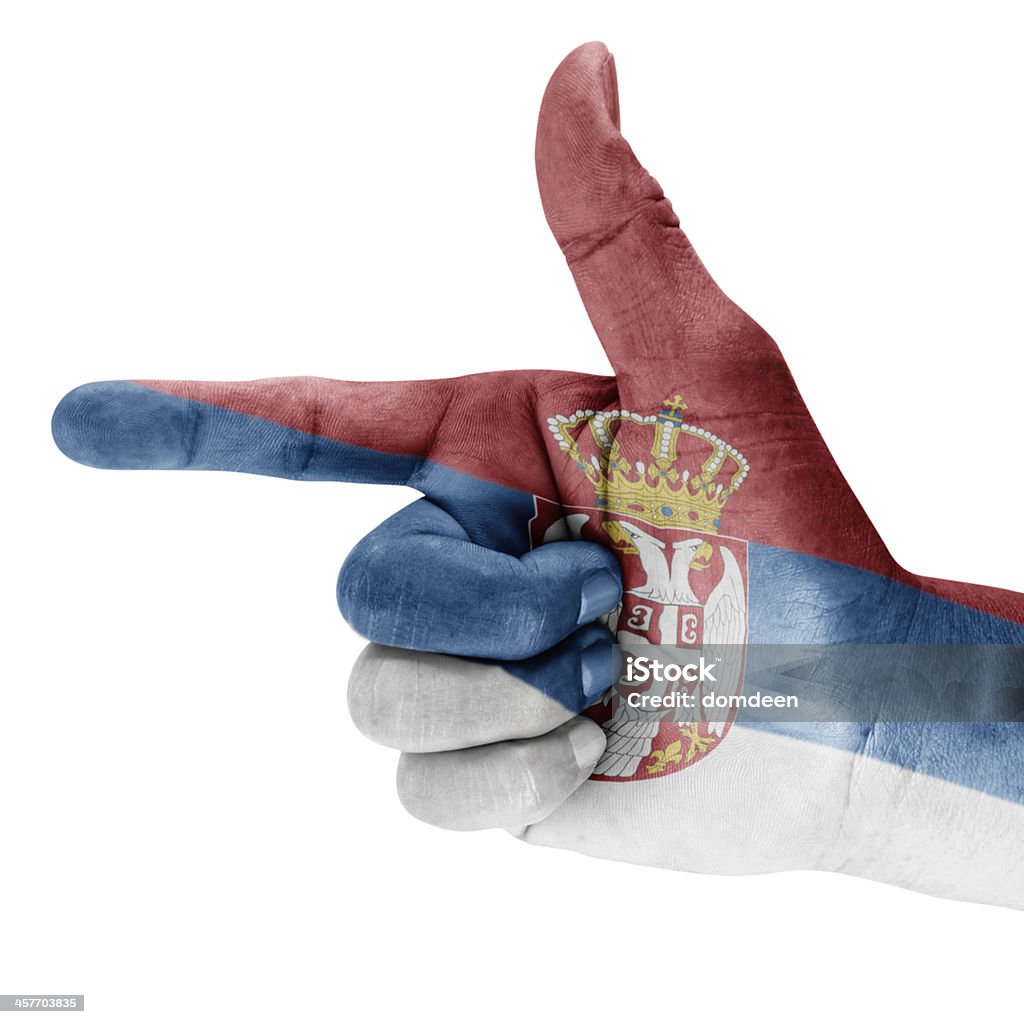 Serbia Flag On Shooting Hand Serbia flag drawn on shoot hand gesture with white background. Aiming Stock Photo