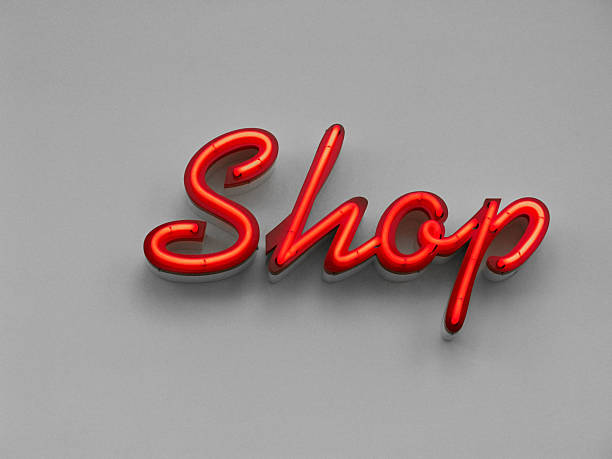 неоновый знак «купить» - hat shop стоковые фото и изображения