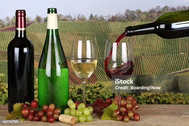 Wine Pouring From A Bottle Into Glass Stock Photo - Download Image Now - Alcohol - Drink, Autumn, Bottle