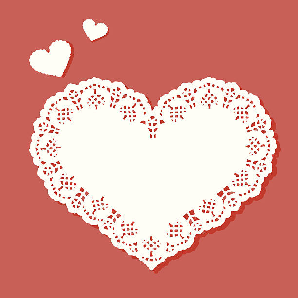 Heart shaped doily with a designer border Heart doily in pink background. doily stock illustrations