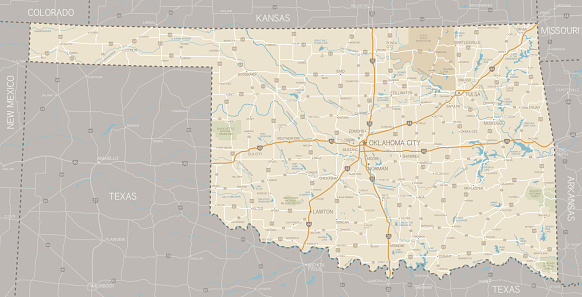 A detailed map of Oklahoma state with cities, roads, major rivers, national forests and lakes. Includes neighboring states and surrounding water. 