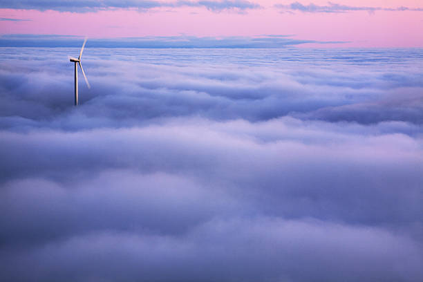 istock Wind turbine in the clouds 457740195