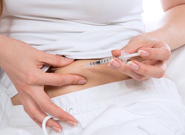 istock insulin syringe pen injection vaccination shot 457740703
