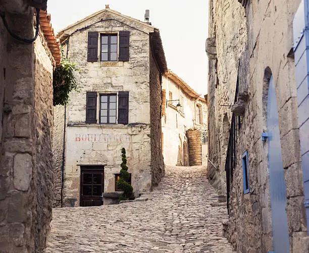 Narrow street in Lacoste - charming, medieval Village in Provence (France).
